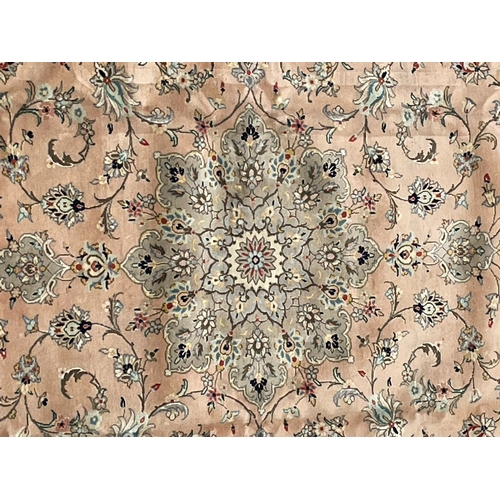 129 - An early 20th century Central  Persian Islamic Kashan floor carpet rug. The rug having a central pin... 