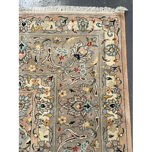 129 - An early 20th century Central  Persian Islamic Kashan floor carpet rug. The rug having a central pin... 