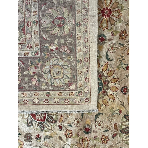 221 - A large 20th century Turkish Islamic Anatolian floor carpet rug. The rug having a central panel deco... 