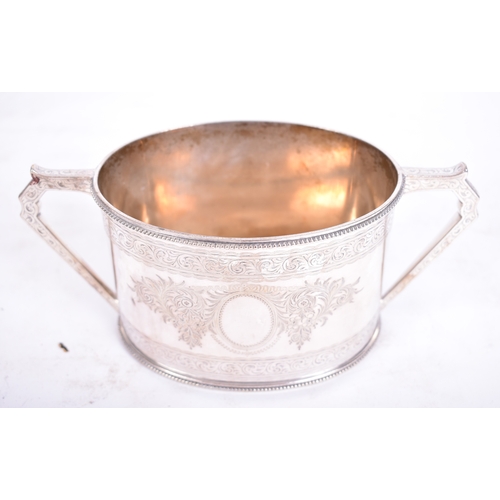 304 - Elkington & Co. - an early 20th century silver plated tea service produced by Elkington & Co. The lo... 