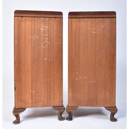 311 - A pair of Queen Anne revival walnut bedside cabinets. Each on stub cabriole legs with pad feet havin... 