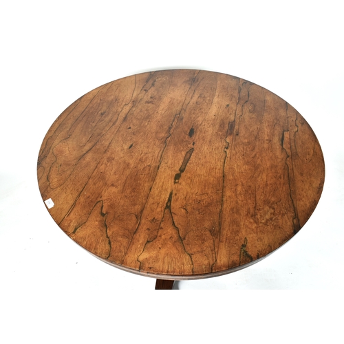 315 - A William IV mid 19th century circa 1850s rosewood breakfast circular table. The table having a soli... 