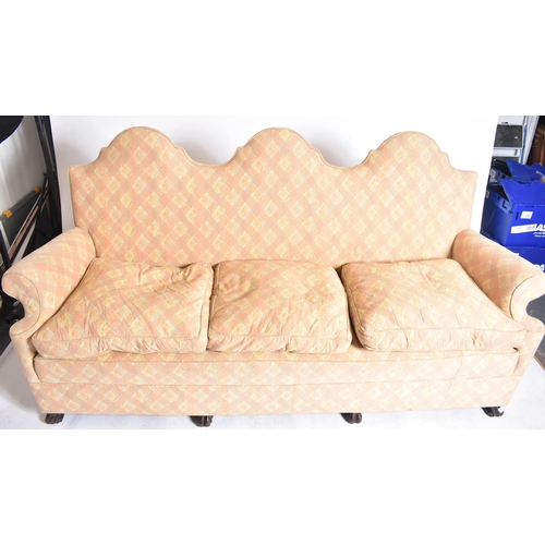 309 - An early 20th century circa 1930s Queen Anne revival Braganza feet upholstered three seater sofa. Th... 