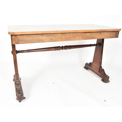 404 - A Victorian 19th century mahogany two drawer side table / writing desk. The table having a straight ... 