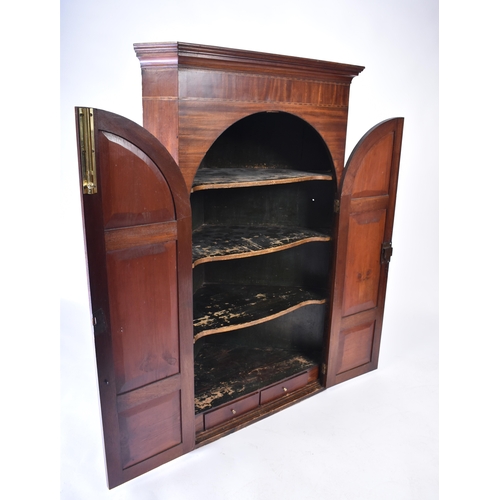 406 - A 19th century Victorian inlaid hanging corner cabinet. The cabinet having a flared cornice with inl... 