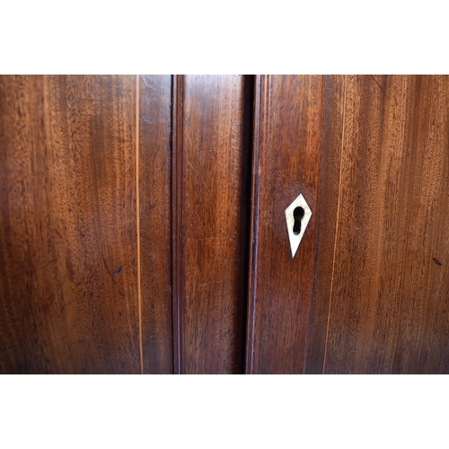 406 - A 19th century Victorian inlaid hanging corner cabinet. The cabinet having a flared cornice with inl... 