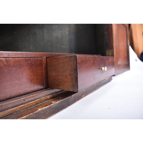 406 - A 19th century Victorian inlaid hanging corner cabinet. The cabinet having a flared cornice with inl... 