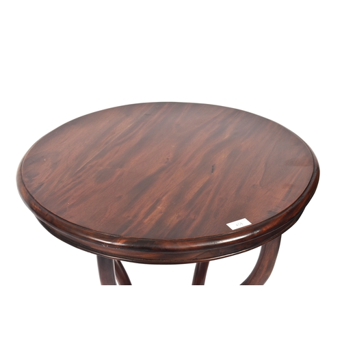 408 - A Victorian 19th century rosewood circular side coffee table. The table having a circular top over a... 