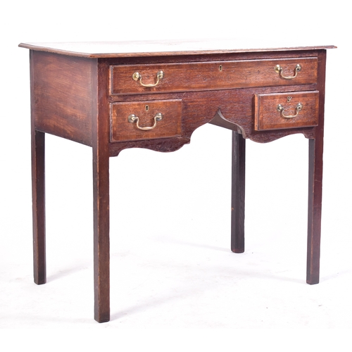 415 - A 18th century George III mahogany lowboy writing table desk. Raised on squared legs with a series o... 