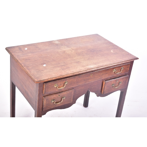 415 - A 18th century George III mahogany lowboy writing table desk. Raised on squared legs with a series o... 