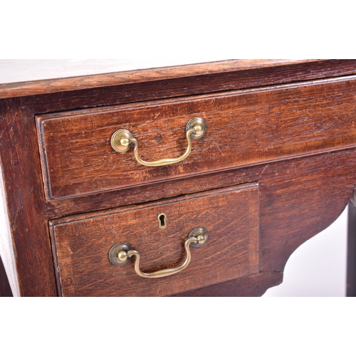 415 - A 18th century George III mahogany lowboy writing table desk. Raised on squared legs with a series o... 