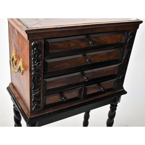 417 - A George III early 19th century circa 1800 walnut veneered collectors' cabinet on later stand. The c... 