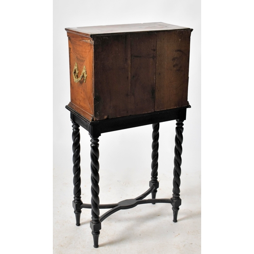 417 - A George III early 19th century circa 1800 walnut veneered collectors' cabinet on later stand. The c... 