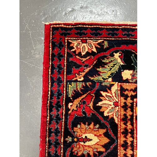 420 - A early 20th century Persian Islamic Ardebil cork wool floor carpet rug. The rug having central grad... 