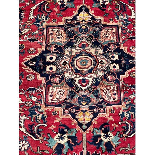 420 - A early 20th century Persian Islamic Ardebil cork wool floor carpet rug. The rug having central grad... 