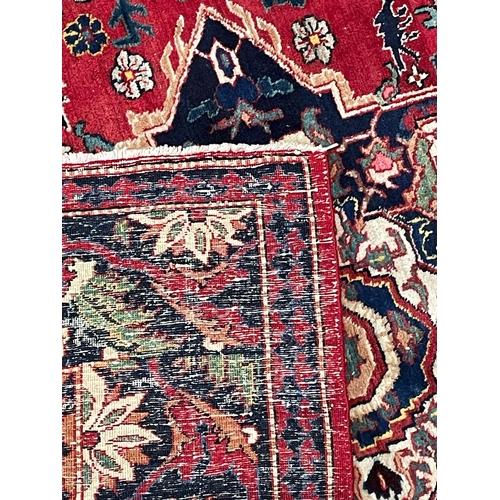 420 - A early 20th century Persian Islamic Ardebil cork wool floor carpet rug. The rug having central grad... 