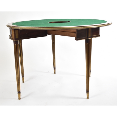 431 - A 19th century Victorian mahogany and brass bound games / card table or roulette table. The table of... 