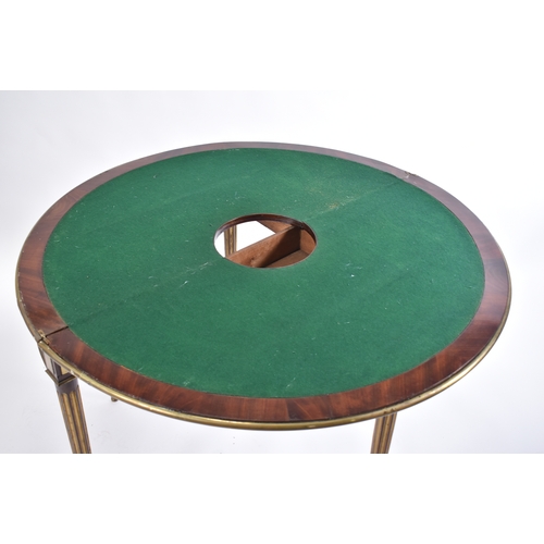 431 - A 19th century Victorian mahogany and brass bound games / card table or roulette table. The table of... 