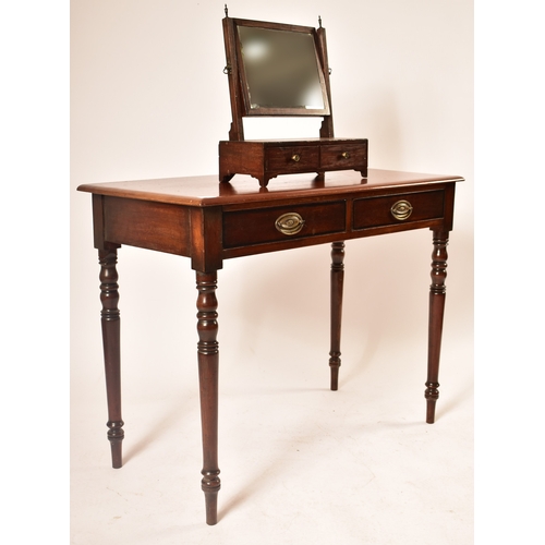 432 - A late Victorian 19th century mahogany writing table desk. The desk being raised on turned legs with... 