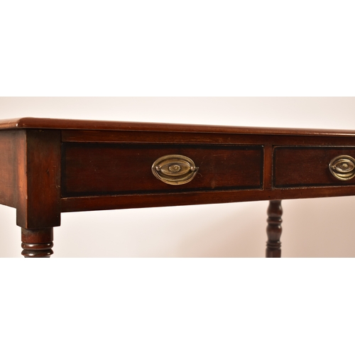 432 - A late Victorian 19th century mahogany writing table desk. The desk being raised on turned legs with... 