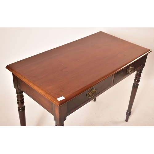 432 - A late Victorian 19th century mahogany writing table desk. The desk being raised on turned legs with... 