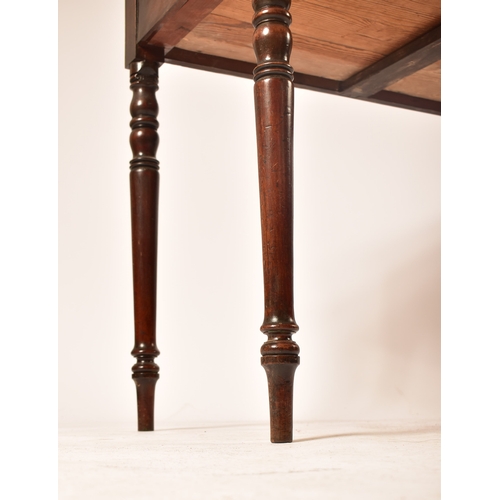 432 - A late Victorian 19th century mahogany writing table desk. The desk being raised on turned legs with... 