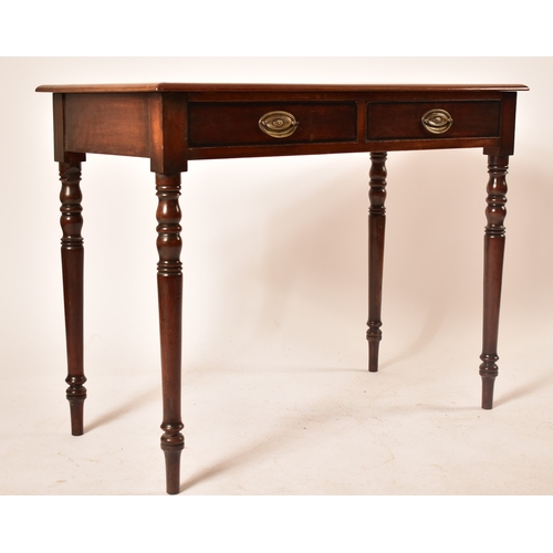 432 - A late Victorian 19th century mahogany writing table desk. The desk being raised on turned legs with... 