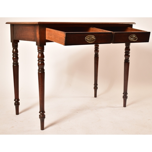 432 - A late Victorian 19th century mahogany writing table desk. The desk being raised on turned legs with... 