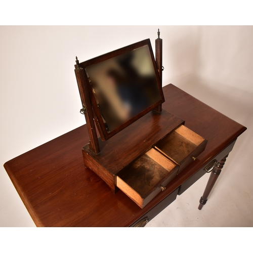 432 - A late Victorian 19th century mahogany writing table desk. The desk being raised on turned legs with... 