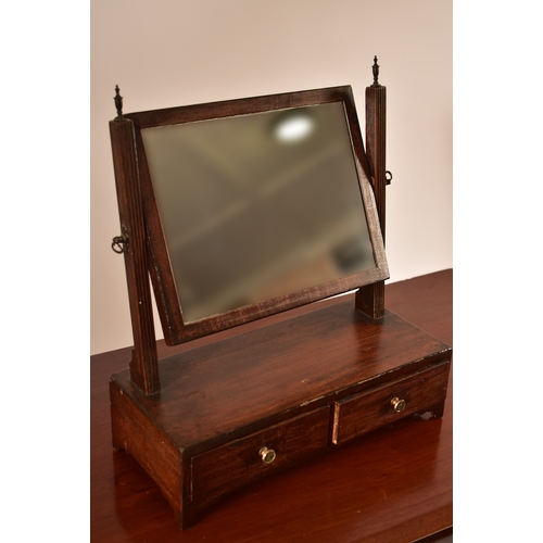 432 - A late Victorian 19th century mahogany writing table desk. The desk being raised on turned legs with... 