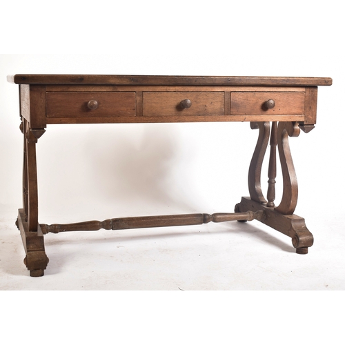 433 - A 19th century French solid oak writing table desk. The desk being raised on lyre shaped supports wi... 