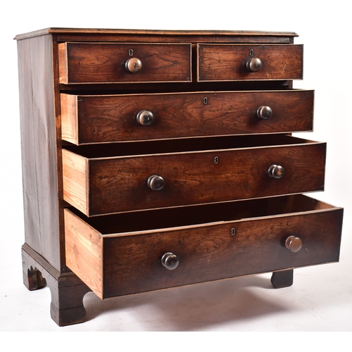 438 - A 19th century George III North Country oak chest of drawers. Raised on bracket feet with short and ... 