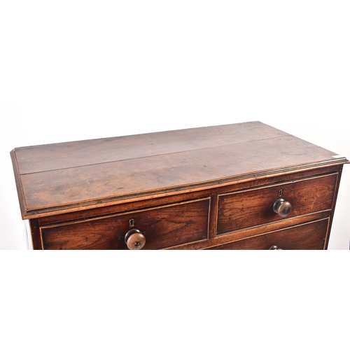 438 - A 19th century George III North Country oak chest of drawers. Raised on bracket feet with short and ... 