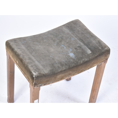 444 - An Elizabeth II limed oak and velvet upholstered coronation stool in the manner of Waring & Gillows.... 