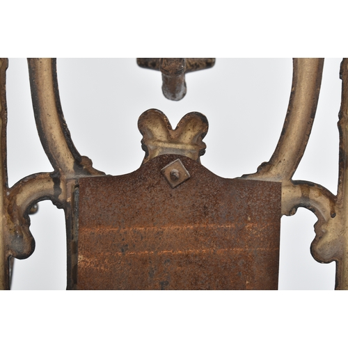 447 - A vintage Coalbrookdale manner faux bamboo cast iron hall stand. The stand having an elaborate back ... 