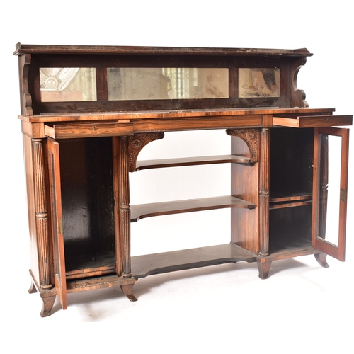 450 - A 19th century rosewood credenza having an open window bookcase with arched top flanked by end glass... 