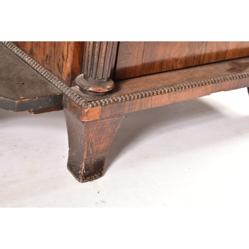 450 - A 19th century rosewood credenza having an open window bookcase with arched top flanked by end glass... 