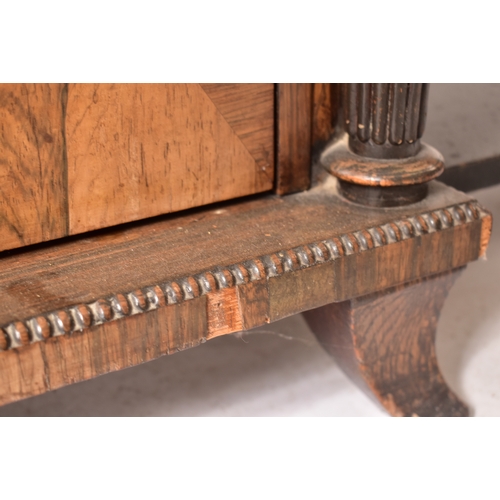 450 - A 19th century rosewood credenza having an open window bookcase with arched top flanked by end glass... 