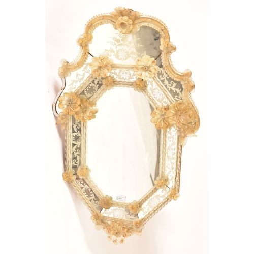 360 - Murano - An early to mid 20th century Italian wall mirror. The mirror of hexagonal form with glass f... 