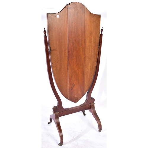 395 - A late Victorian 19th century mahogany inlaid cheval swing floor mirror. The mirror having a shield ... 