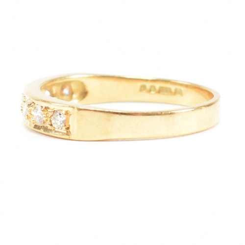 100 - A hallmarked 18ct gold and diamond seven stone ring. Estimated diamond weight 0.30ct. Hallmarked Lon... 