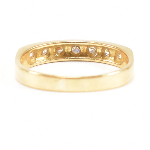 100 - A hallmarked 18ct gold and diamond seven stone ring. Estimated diamond weight 0.30ct. Hallmarked Lon... 