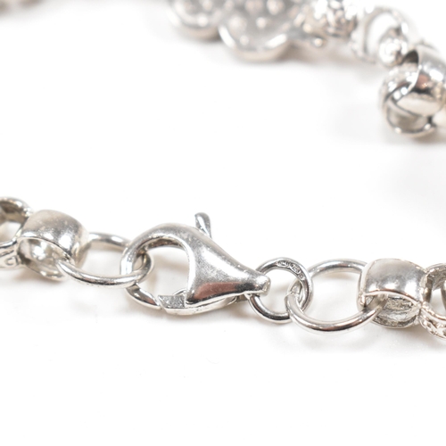 101 - A contemporary silver bracelet with heart shaped clasp set with cubic zirconia CZ. Marked Birmingham... 