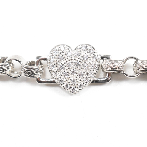 101 - A contemporary silver bracelet with heart shaped clasp set with cubic zirconia CZ. Marked Birmingham... 