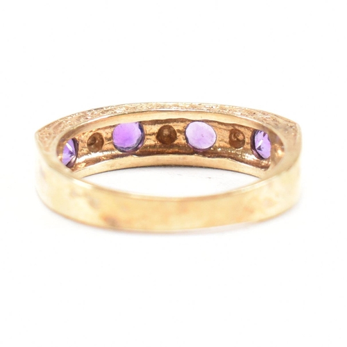 103 - A hallmarked 9ct gold amethyst and diamond half eternity ring. Weight 3.6g. Size N. All weights, mea... 