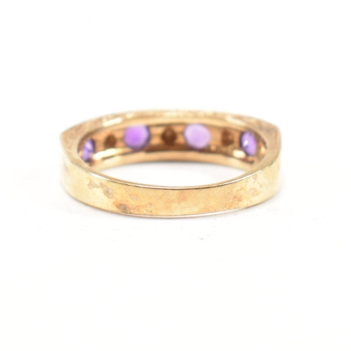 103 - A hallmarked 9ct gold amethyst and diamond half eternity ring. Weight 3.6g. Size N. All weights, mea... 