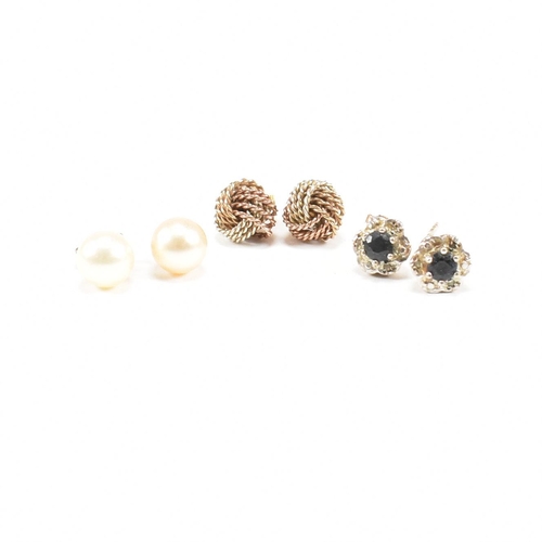 104 - Three pairs of gold earrings. The earrings to include knot marked 375. Cultured pearl unmarked. Sapp... 