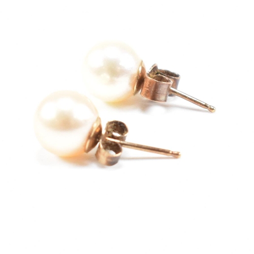 104 - Three pairs of gold earrings. The earrings to include knot marked 375. Cultured pearl unmarked. Sapp... 