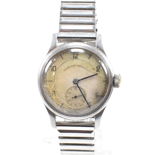 105 - A WW2 period West End Watch Company Longines wristwatch.  British civil service in India issue wrist... 