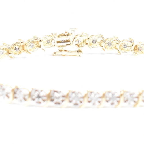 106 - A 9ct gold and diamond line bracelet.  Weight 6.1g / Measures 17.5cm. Marked 10k. All weights, measu... 